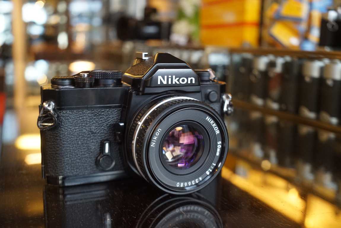 Nikon FM black + Nikkor 50mm f/1.8 AIS Pancake - Fotohandel