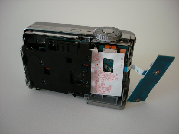 Sony Cyber-shot DSC-W5 battery compartment replacement - iFixit