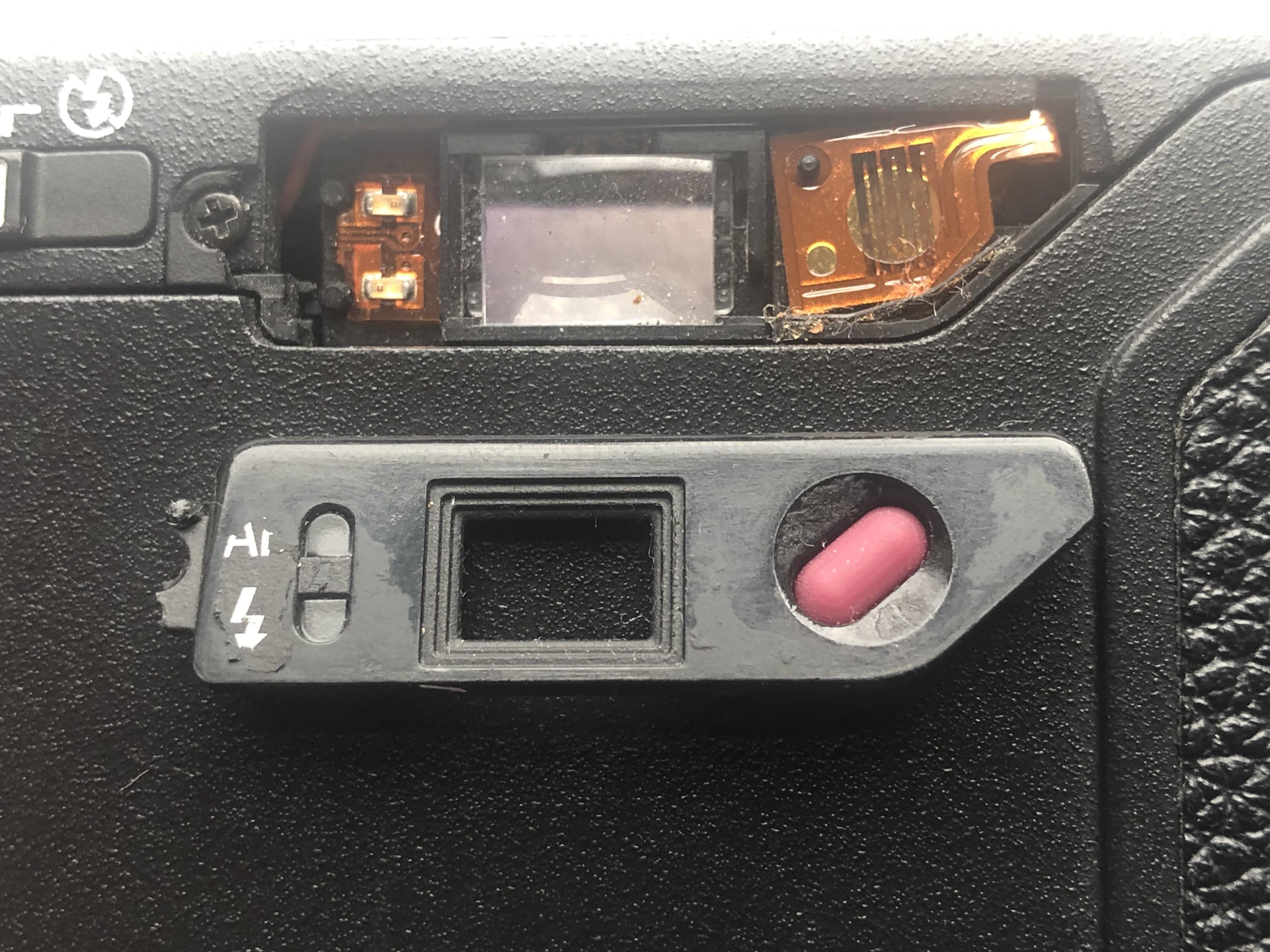 Looking for a replacement to a broken Ricoh GR1v part from the