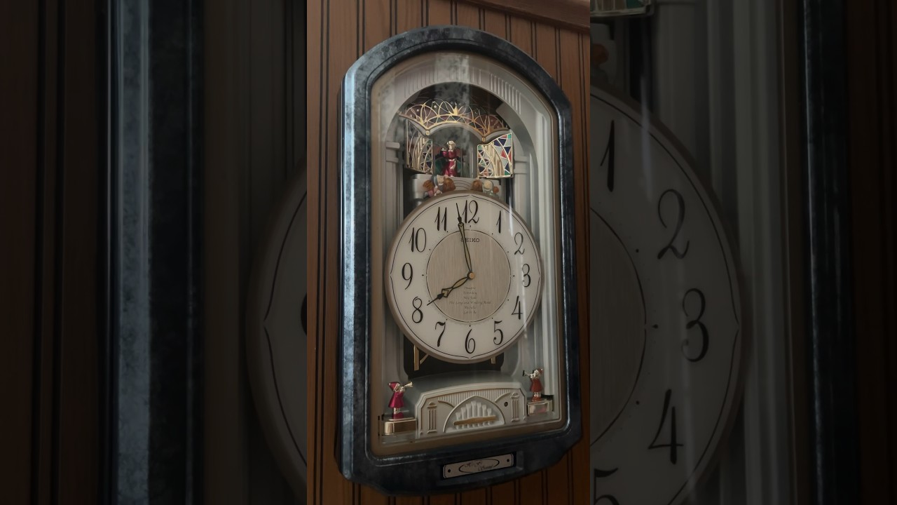 SEIKO QXM132LRH Beatles Dropping Dial Melodies in Motion Clock