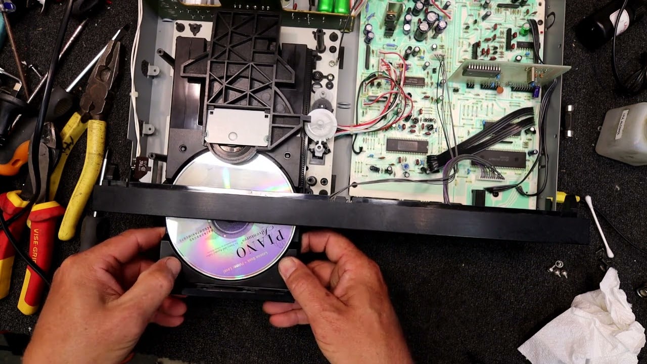 CD Player Repair Part 3. Servicing and replacing the tray loading