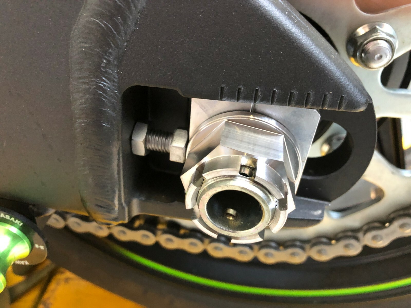 KAWASAKI ZH2 2020-2025 REAR AXLE CASTLE FLANGED NUT TITANIUM M24X1