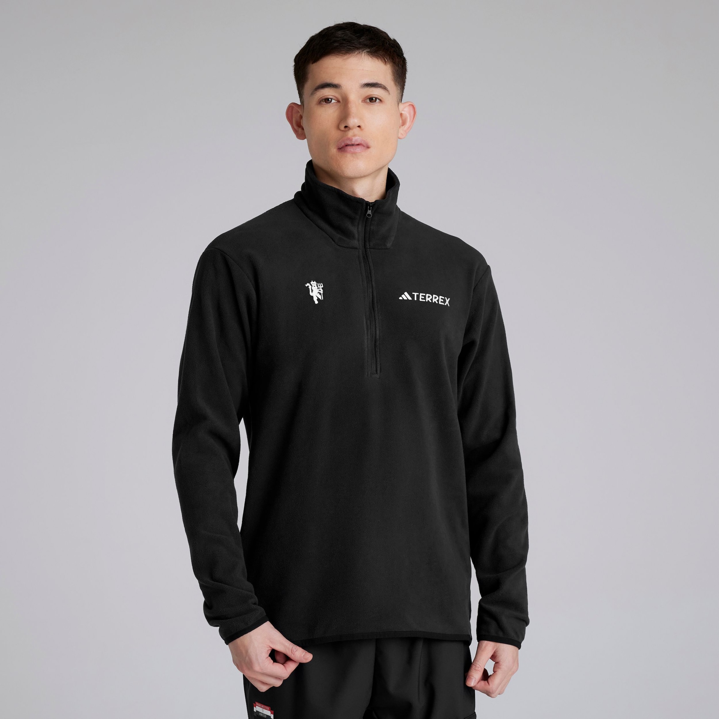 Buy Manchester United x adidas Terrex 1/2 Zip Fleece Jacket Black