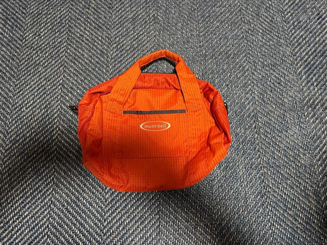 mont-bell オレンジ ショルダーバッグL.W.ダッフル - メルカリ