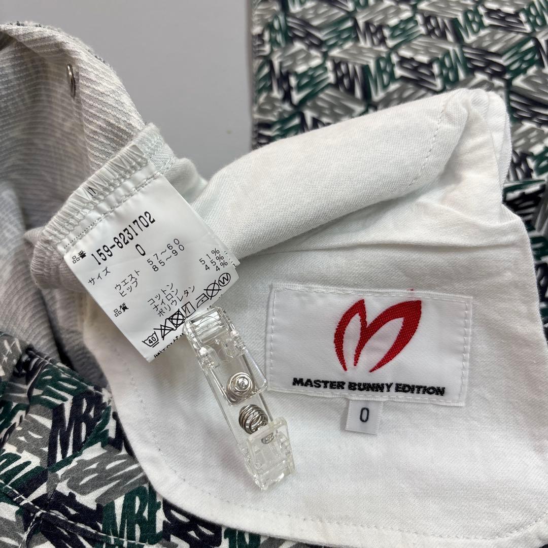 マスターバニーエディション 0/S ロングパンツ 総柄 ロゴ グリーン系
