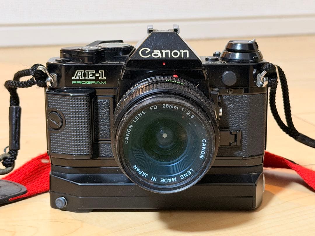 Canon AE-1 PROGRAM 一眼レフカメラ 28mmレンズ付き - メルカリ