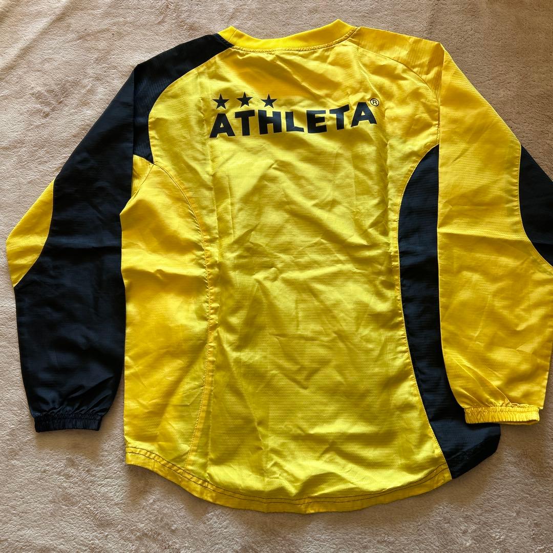 シャカシャカATHLETA ピステ上下 黒/黄色 - メルカリ