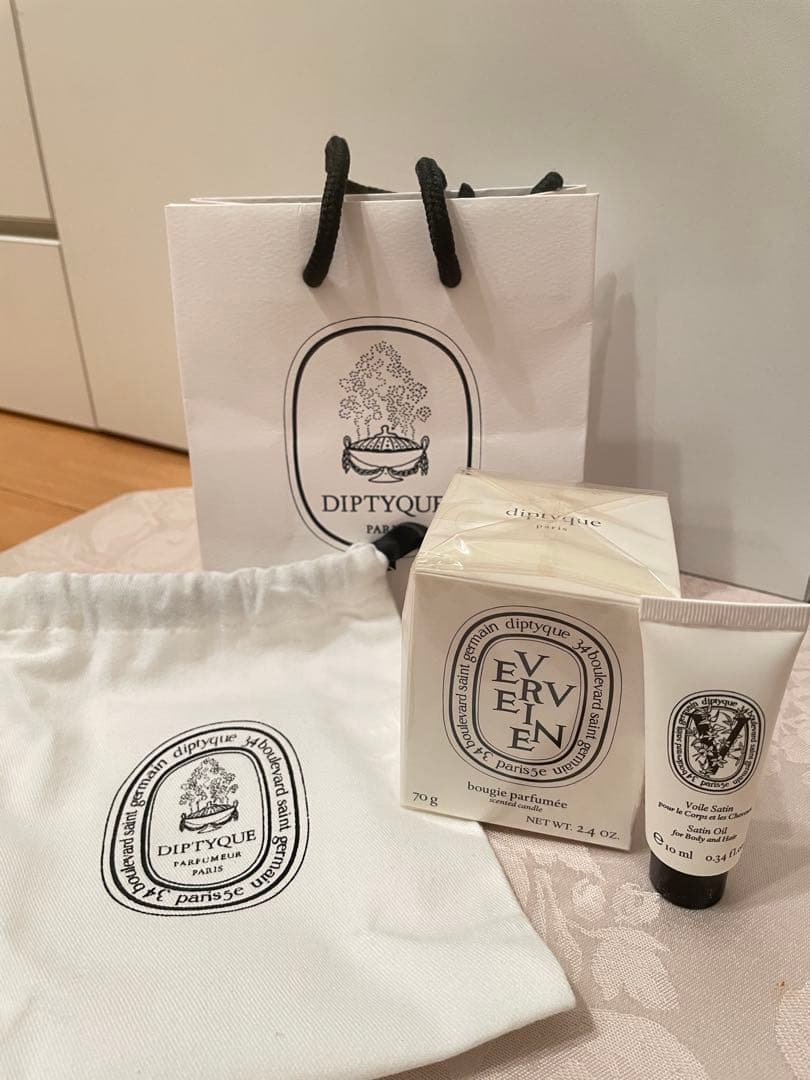 DIPTYQUE ミニキャンドルとボディ＆ヘアオイル※巾着紙袋付き - メルカリ