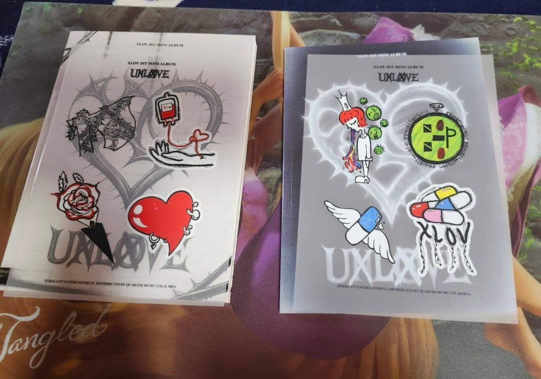 xlov開封済みアルバム2冊セット（＋600円〜トレカ付） - メルカリ